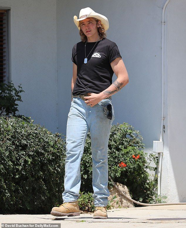 Madsen's youngest son Luke, 19, was also spotted at the scene