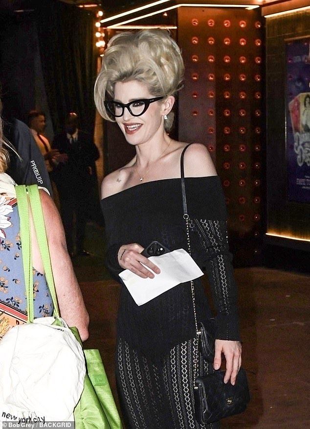 Kelly Osbourne showcased her slender frame in a knitted dress and sported a voluminous blonde beehive as she attended theDiamonds and Dust gala