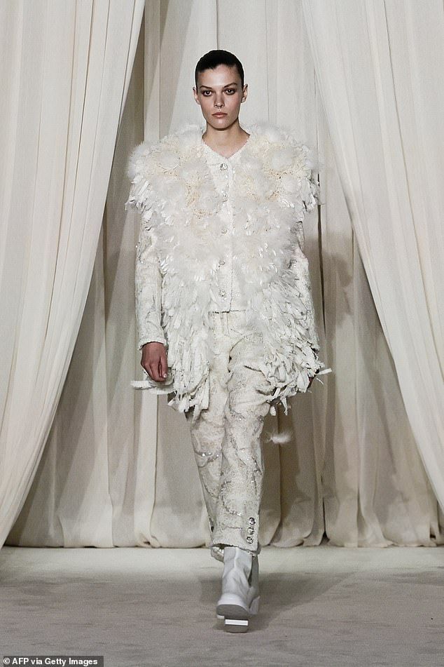 A model presents a creation for Chanel during the Women's Haute-Couture Fall/Winter 2025-26 collection show in Paris