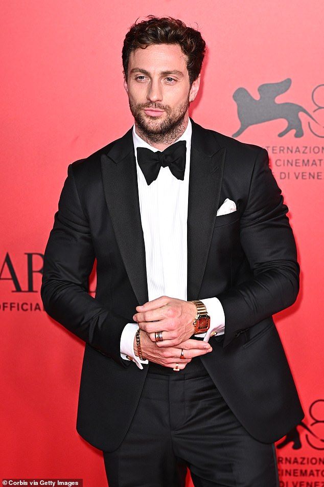 Aaron Taylor-Johnson could be in line to play the next James Bond, after Tom Holland was dubbed 'too adorable' for the role (Aaron pictured in August)