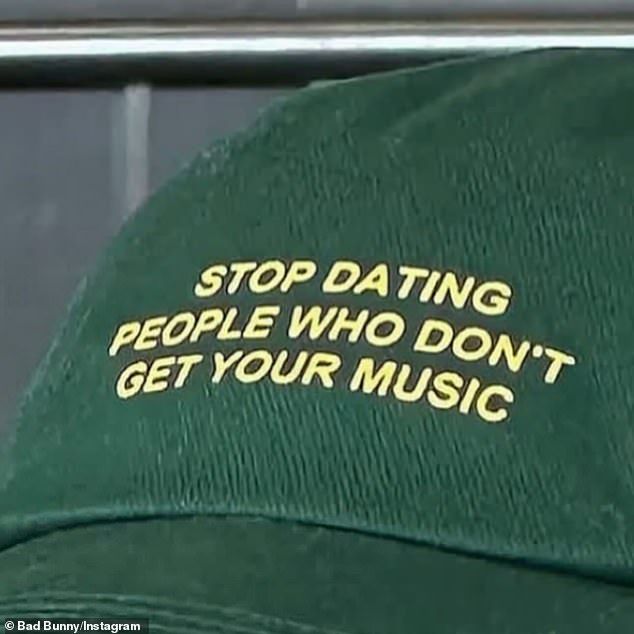The 31-year-old NUEVAYoL rapper-singer posted an Instagram slideshow featuring 12 images but his fans all focused on a baseball cap emblazoned with the phrase: 'Stop dating people who don't get your music'