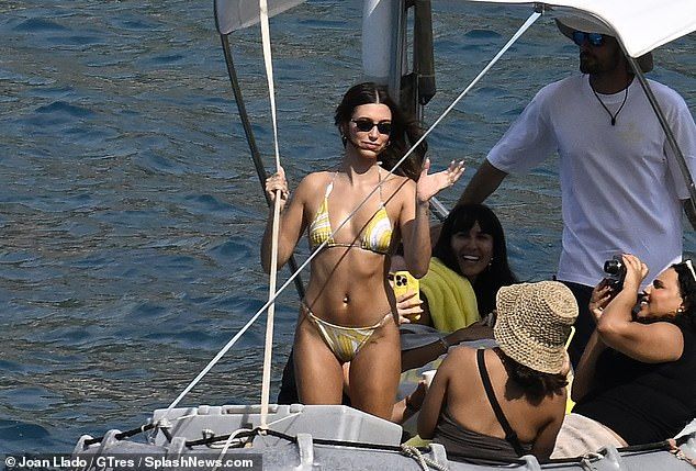 The star was joined by her team on board a small boat as she turned to get the best shots