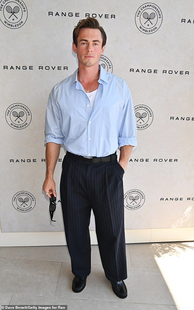 Ben Radcliffe looked dapper in a pale blue shirt and pinstripe black trousers