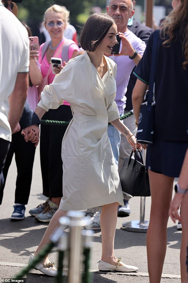 Lily Collins arrived in all white