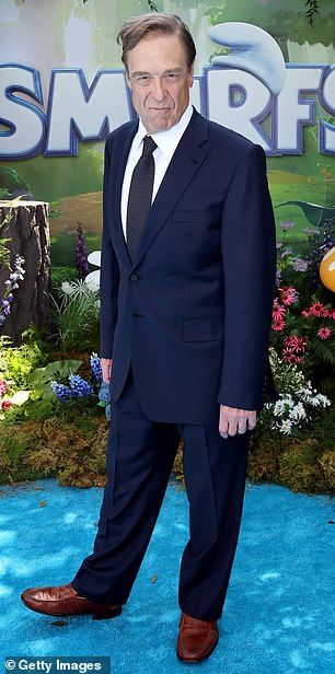 The Big Lebowski actor - who has showed off his 200lb weight loss in recent years - additionally wore a white dress shirt as well as a gray tie and brown loafers