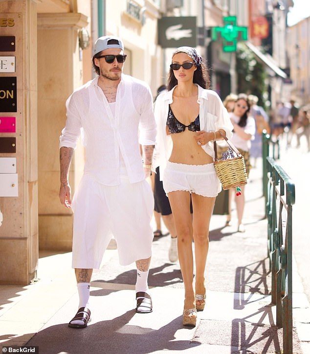 But the couple brushed off the family feud on Tuesday, putting on a loved-up display as they strolled hand-in-hand through St Tropez