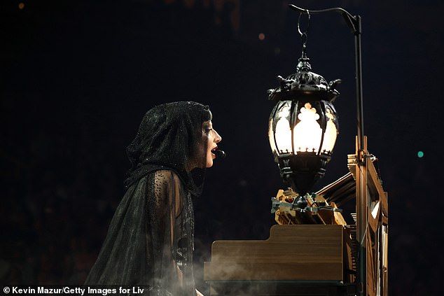 She pulled on a gothic cape and took to the piano for a toned-down emotional track, before bringing out a humongous spinning skull for Killah