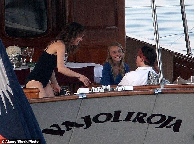 After nearly two-and-a-half months, production wrapped. Johnny took a holiday on his yacht with Vanessa (above) and their kids, Lily-Rose (above) and Jack