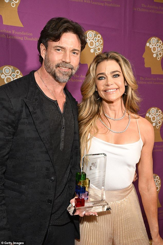 Phypers claims he confronted Richards about the alleged affair, and they decided to stay together. But a July 4th dispute ultimately prompted him to file for divorce; Seen in May