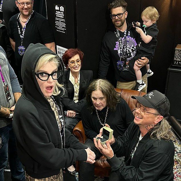 Kelly's engagement pictured at Ozzy's final show this year. She visited him in the weeks before he died