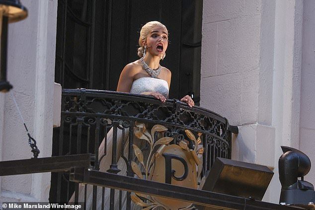 Hundreds of people gather outside the venue for the Snow White star's performance of Don't Cry For Me Argentina on the balcony, made famous by the likes of Elaine Paige and Madonna