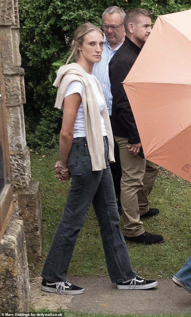 It was a rainy start to proceedings on Thursday. Pictured: One of the wedding guests