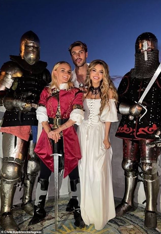 The brides posed with men in knight costumes on their big day