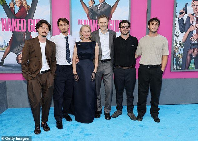 And as the pair - who are claimed to have 'confirmed' romance rumours after fuelling speculation following a chemistry-laden performance in a new comedy flick, The Naked Gun together - were joined by their grown-up actor sons on the red carpet, their unit