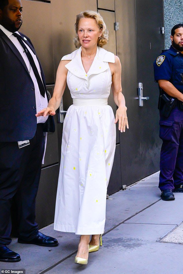 The Baywatch veteran was makeup free with her hair worn in soft curls as she added gold high heels for a touch of glamour. The mother-of-two has been promoting her new film Naked Gun, which comes out August 1
