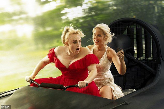 The film follows a mercenary group who get more than they bargained for when they take a wedding party hostage. Little do they know that the maid of honour, played by Rebel, is actually a secret agent. Also pictured: Anna Camp