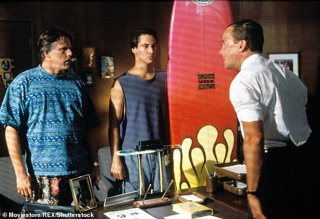 Oscar nominee Busey is pictured in Point Break with Keanu Reeves in 1991