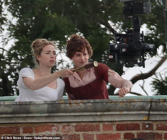 Freya was seen holding avintage monocular telescope amid filming