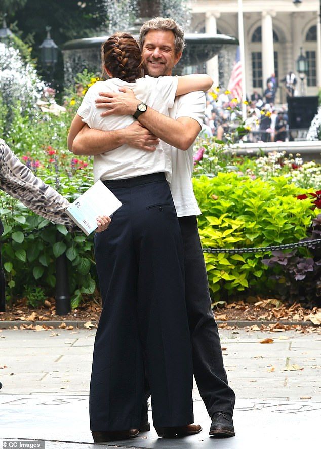 They also shared a close hug when the cameras seemed to be off and a costar walked by holding a book