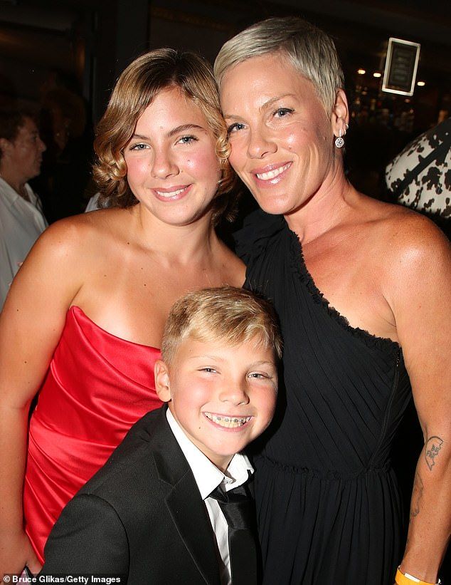 The Raise Your Glass singer - who is married to motocross racer Carey Hart - was also joined by her son (bottom) as they attended the festivities at The Richard Rogers Theatre on Broadway