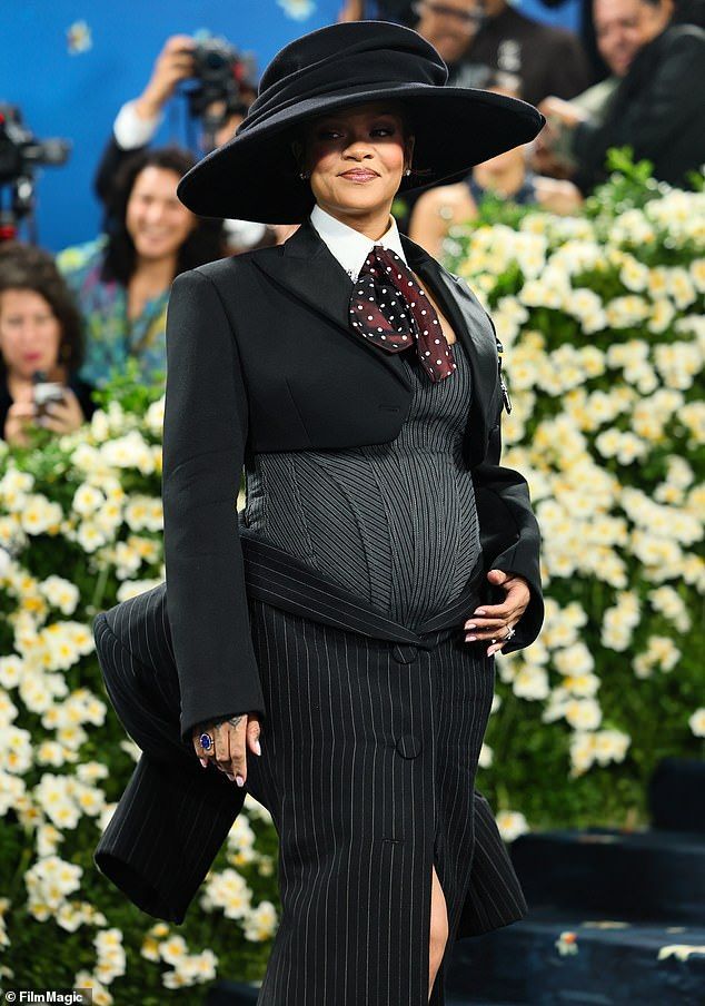 She initially unveiled her growing baby bump before glamming up for the annual event in NYC, and later offered her thoughts on her pregnancy while walking the red carpet; seen above at MET Gala in May