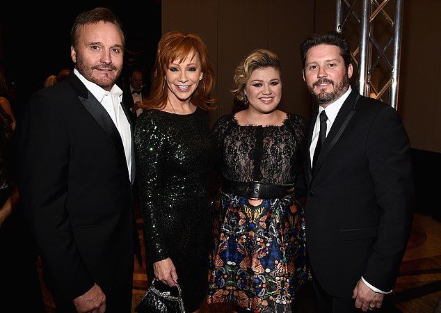 Blackstock's death could also affect the currently taping season 28, as celebrity coach Reba McEntire is Blackstock's former stepmother. She was married to his father, Narvel Blackstock (L), from 1989 until 2015; pictured in 2015 in Phoenix, Ariz.