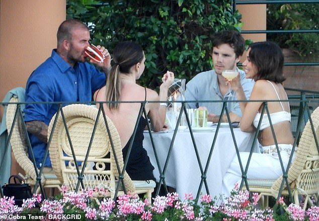The family sipped cocktails and shared a giggle