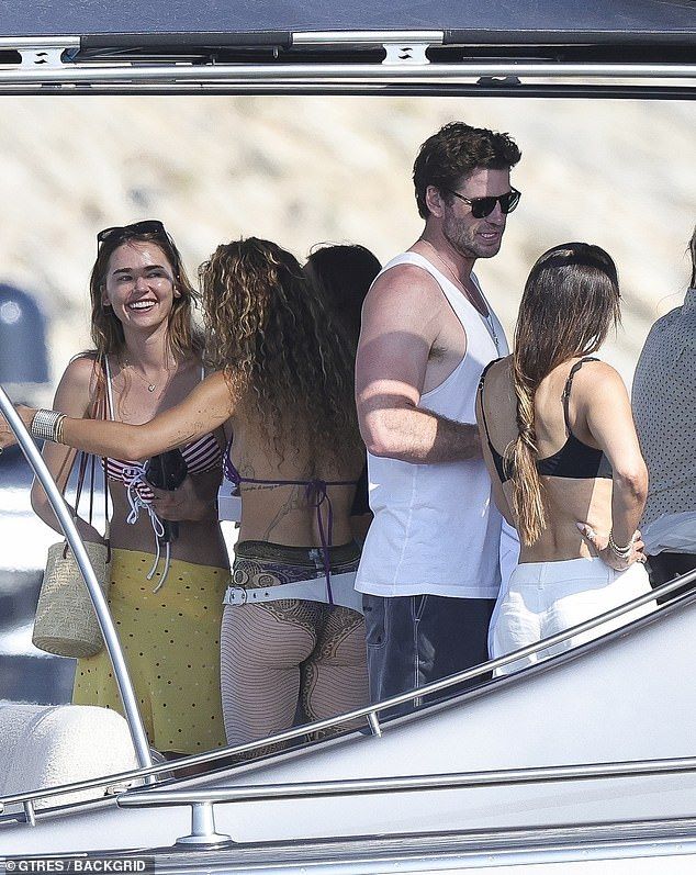 Liam was pictured chatting on the yacht