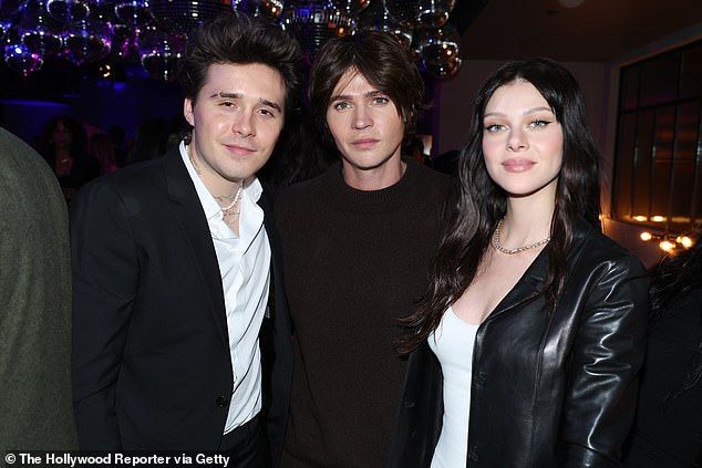 Nicola has grown up surrounded by the support of her six brothers, and previously revealed that it was actually her sibling Diesel who introduced her to Brooklyn (the couple are pictured with Nicola's brother Will in 2022)