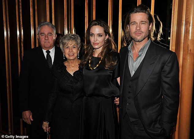 Earlier this month, it was revealed that Brad's mother Jane Etta Pitt had reportedly passed away; Brad seen with father Bill (far left), his late mother Jane and Angelina in 2011 in NYC