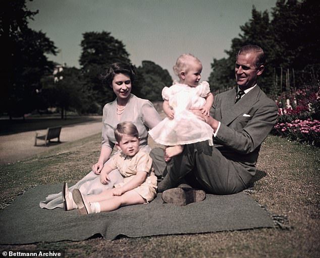 A young Princess Anne and King Charles III with their mother, Queen Elizabeth II and their father Philip