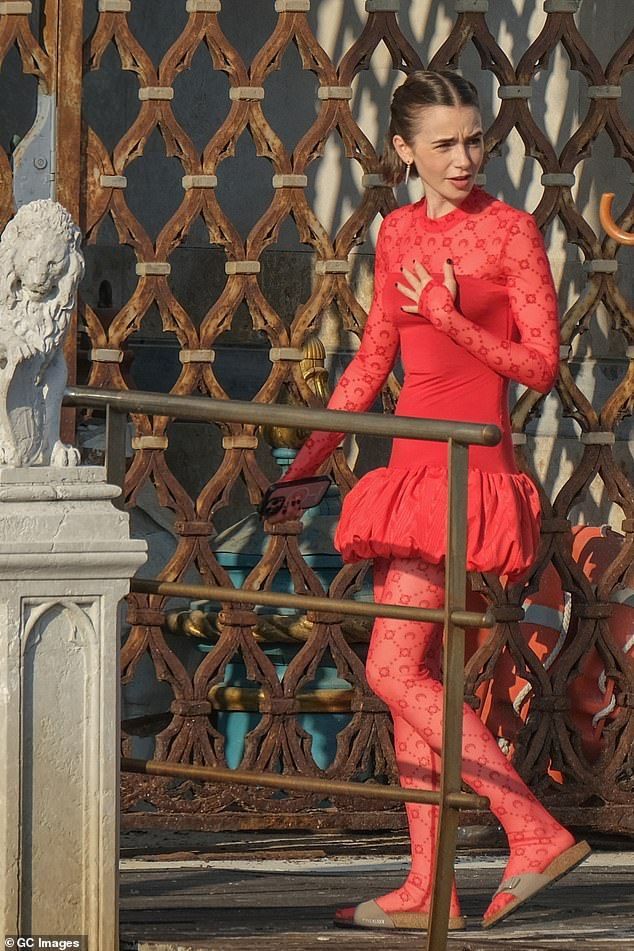 Lily Collins is typically spotted wearing a pair of towering heels but as she films scenes for fifth season of Emily In Paris in Venice it has appeared she has ditched her killer stilettos