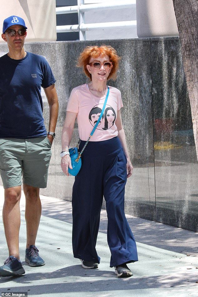 The comedian was spotted shopping at the Studio City Farmer's Market in Los Angeles with a mystery man