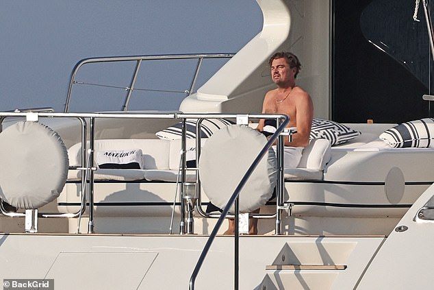 DiCaprio stared into the distance in a moment of quiet contemplation after enjoying a dip with supermodel love Ceretti, 27