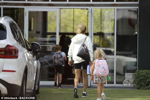 The Russian appeared fit and healthy as she took her children to their martial arts class