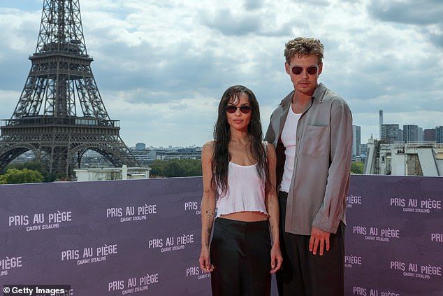 The pair, who star together in Darren Aronofsky's comedy crime film, looked in jovial spirits while cosying up to another