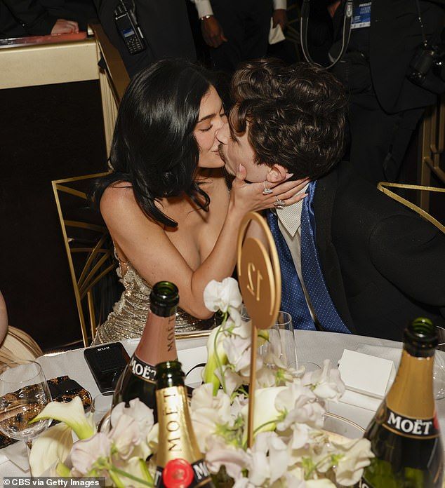 The insider confirmed the couple are 'very much together and don't need to be in person together every day for it to work' (seen inJanuary 2025)