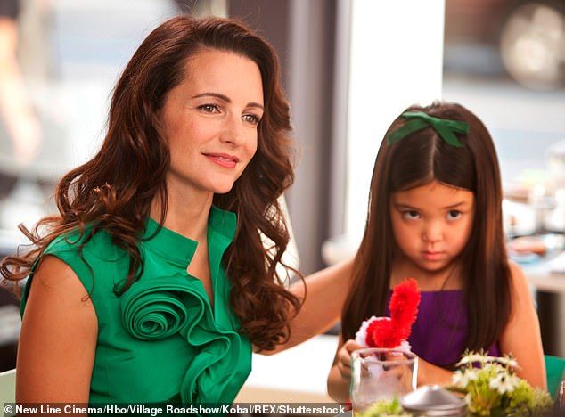 Kirstin raises her two children as a single parent (pictured with her on-screen child in Sex and the City)