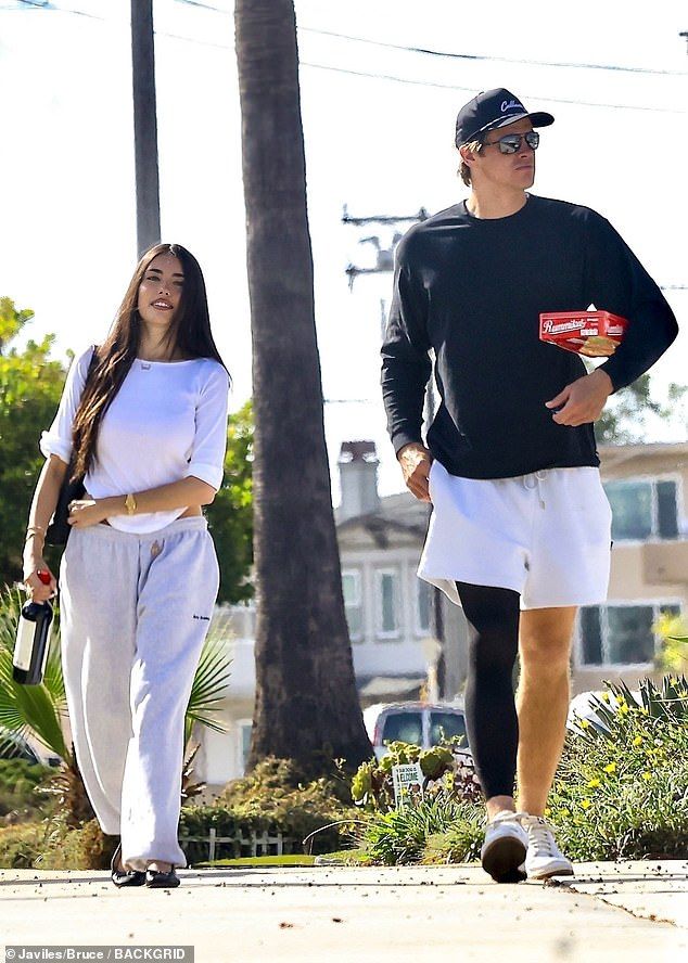 Fans were quick to comment on how weird it was that she added ballet flats with sweatpants. 'Is this a new trend?' asked one follower while another chimed in, 'Are we all just not going to comment on the ballet shoes & sweats combo?'