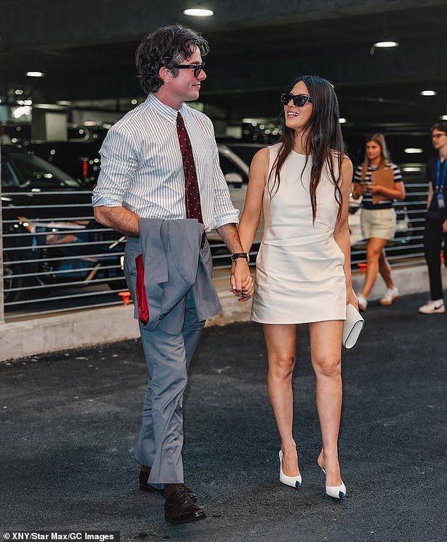 The half-Vietnamese beauty - who relies on stylist Yael Quint - looked leggy in a sleeveless beige mini-dress, which she paired with a summery white clutch and blue-toed high-heel mules