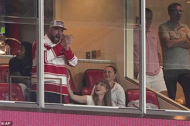 The happy couple were at a college football game at Arrowhead Stadium on Thursday night