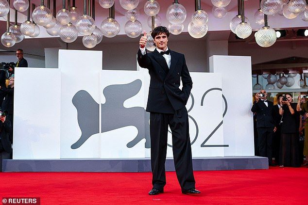 Jacob Elordi poses on the red carpet for the screening of Frankenstein at the 82nd Venice International Film Festival