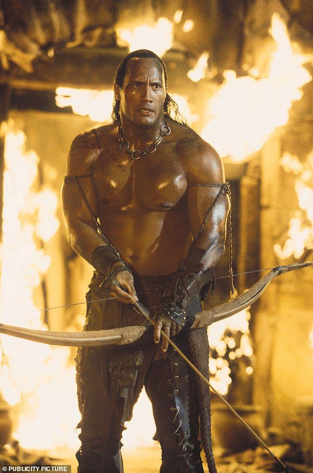 Now, an expert has revealed to the Daily Mail the secrets behind how the star has achieved such an extreme transformation (Dwayner pictured in 2002)