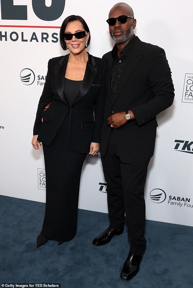Meanwhile long term partner Corey, who has been dating the Kardashian matriarch since 2014, also dressed in black and looked smart in a suit