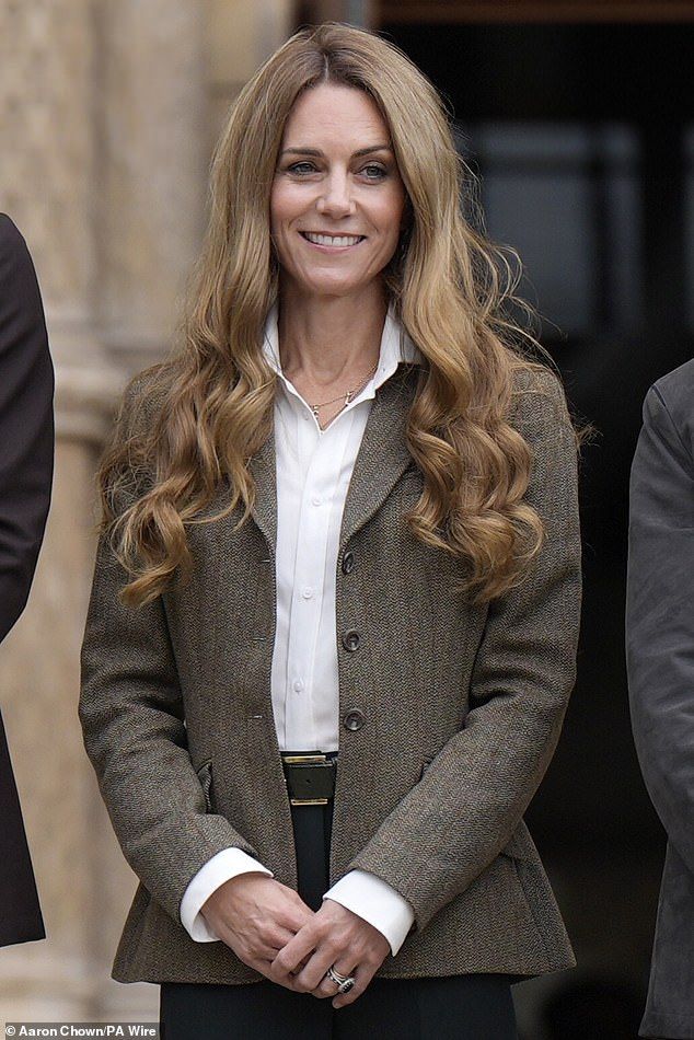 Appearing for the first time since landing back from a family holiday in Greece , Kate showed off a hint of a tan and unveiled her new flaxen locks - much to the delight of gushing fans