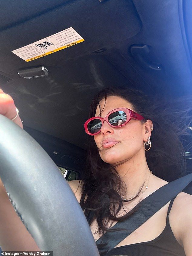 In this snapshot, the model is makeup free as she wears pink framed Chanel sunglasses