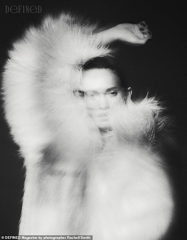 She wore a fur coat and gave a piercing glare into the camera