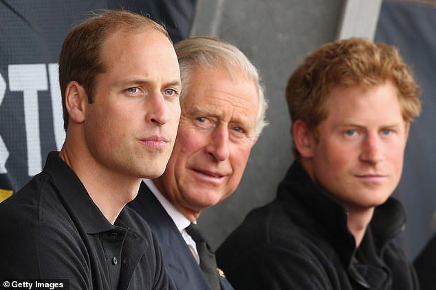Princes William and Harry with the then-Prince of Wales at the Invictus Games in 2014