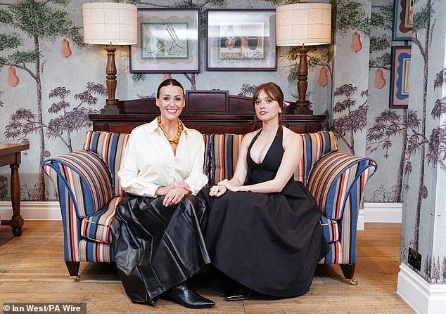 Suranne looked incredible in a white shirt and a black leather skirt with matching boots