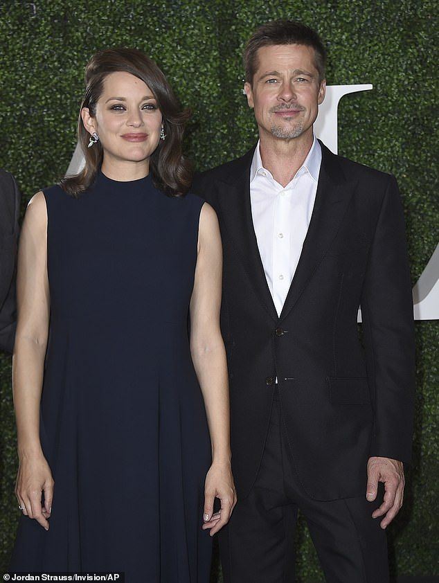 Brad Pitt with Cotillard at the premiere of Allied in 2016. Boshoff writes: 'OneHollywood source, who had a ringside seat on the disintegration of Pitt and Jolie's marriage in 2016, tells me that Pitt would rave about Marion's French elegance and style'